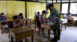 Mengabdi Untuk Negeri, TNI Jadi Tenaga Pengajar Diperbatasan Indonesia – Malaysia